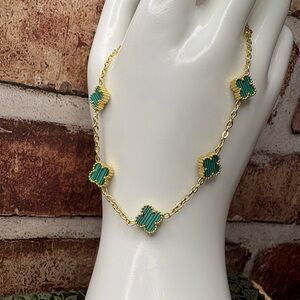 Elegant Gold and Green Clover Necklace